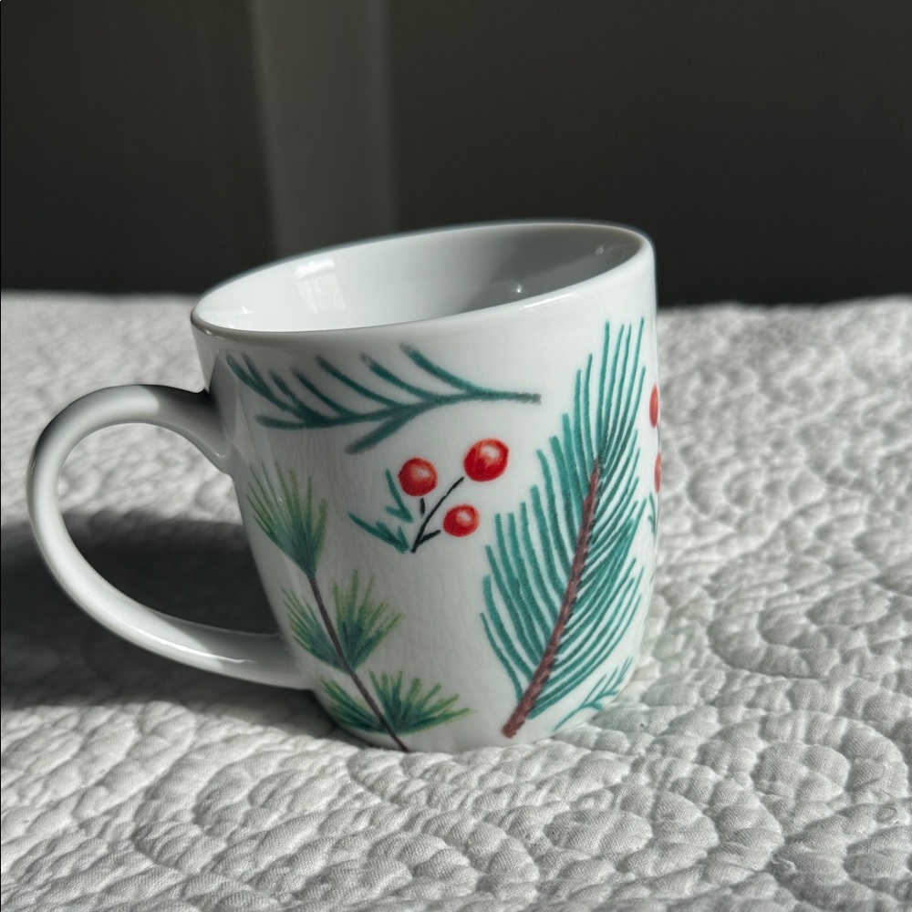 White Ceramic Mug with Green Pine and Red Berry Design